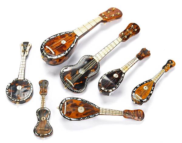 Appraisal: An assembled grouping of seven Continental tortoiseshell ivory and mother-of-pearl