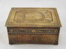 Appraisal: A WMF wood lined brass cigarette box with hammered finish