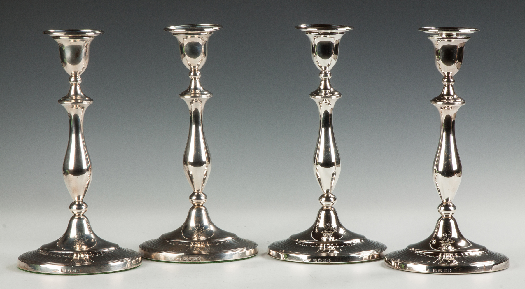 Appraisal: John Green Co Set of Four George III Sheffield Candlesticks