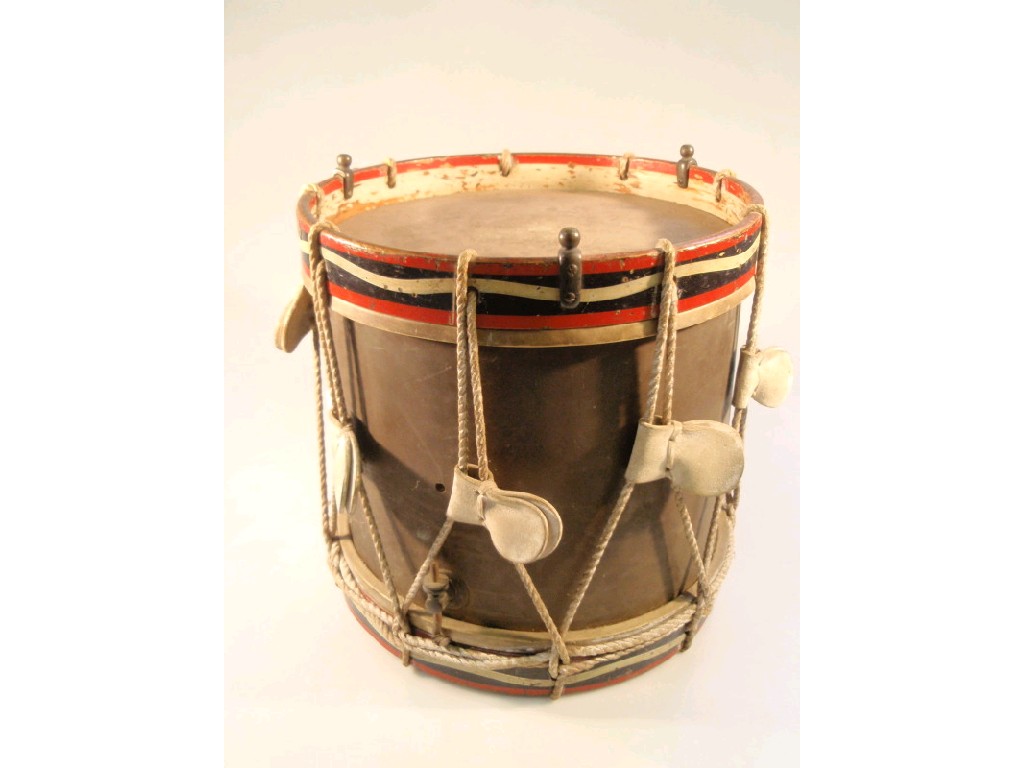 Appraisal: A regimental snare drum with brass body and painted wooden