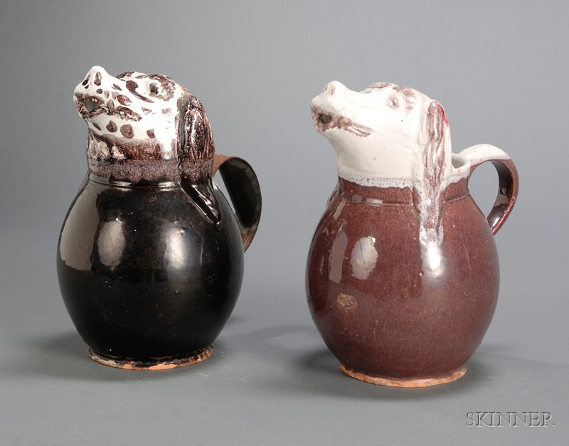 Appraisal: Two Tin Glazed Earthenware Hound Jugs probably Germany th th