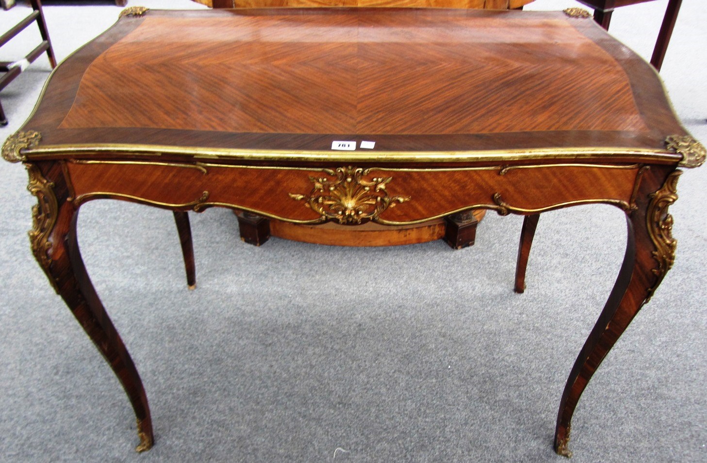 Appraisal: A Louis XV style gilt metal mounted kingwood and rosewood