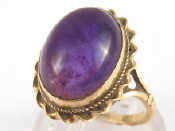 Appraisal: A carat gold cabochon amethyst ring amethyst approx x mm