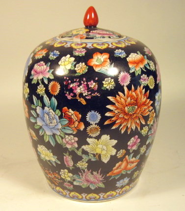 Appraisal: Two Chinese enameled porcelain covered jarsComprising a Famille Noire and