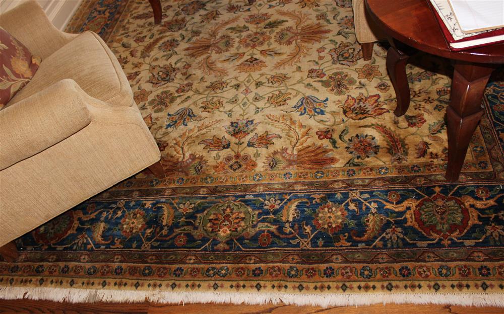 Appraisal: INDO PERSIAN TABRIZ WOOL FLORAL RUG overall scrolling foliate design