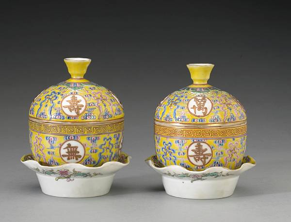 Appraisal: A pair of yellow ground porcelain covered birthday bowls and