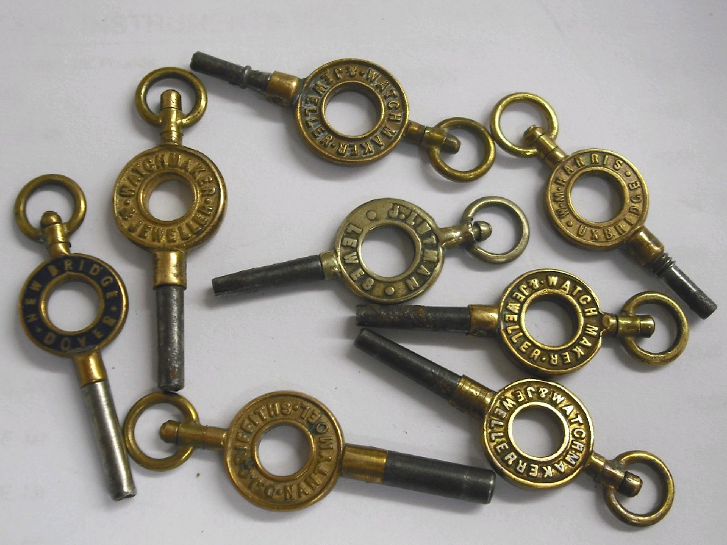 Appraisal: Eight assorted loop design advertising pocket watch keys