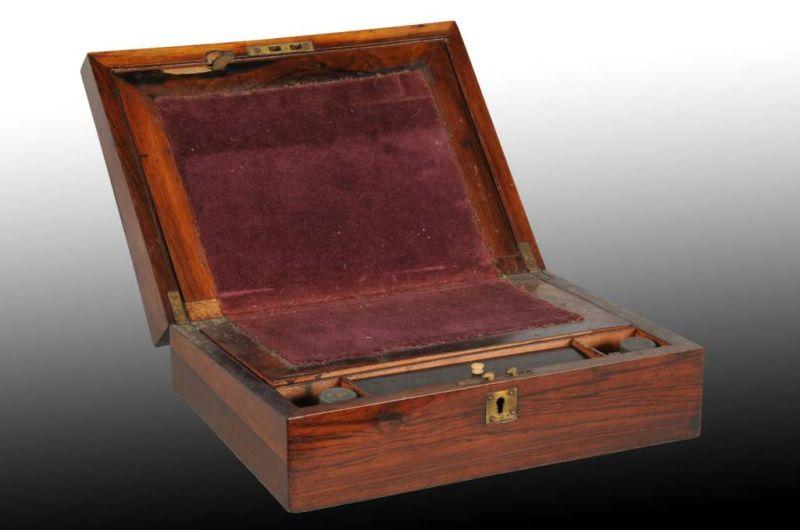 Appraisal: Victorian Laptop Wooden Desk Description Circa Includes two inkwells and