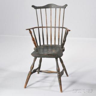 Appraisal: Black-painted Fan-back Windsor Armchair New England c the serpentine crest