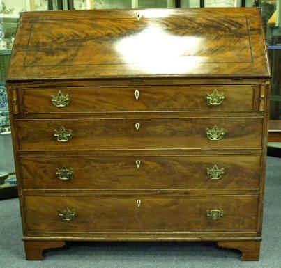 Appraisal: A late th Century mahogany bureau fitted beneath the fall