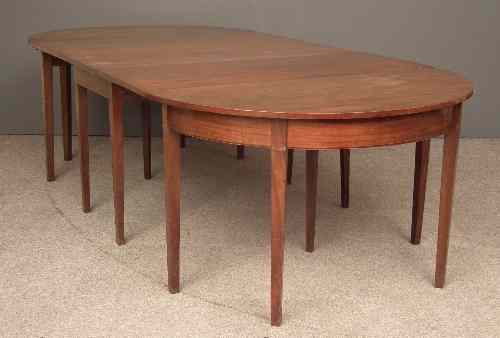 Appraisal: A George III mahogany extending dining table comprising - two