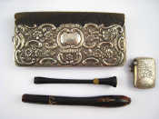 Appraisal: A mixed lot A lady's wallet with embossed silver cover