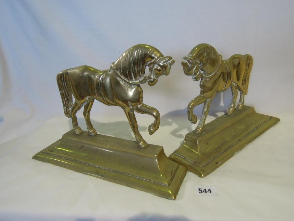 Appraisal: A pair of doorstops in the form of two prancing