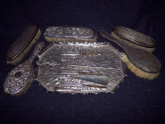 Appraisal: A quantity of silver mounted dressing table items including brushes