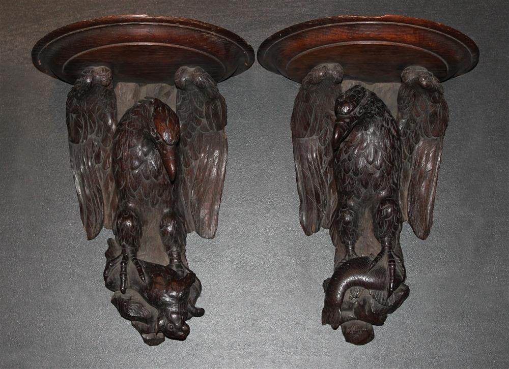 Appraisal: PAIR OF CARVED OAK BLACK FOREST TYPE WALL BRACKETS late