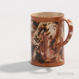 Appraisal: Red Earthenware Slip-marbled Mug England c the inside covered in