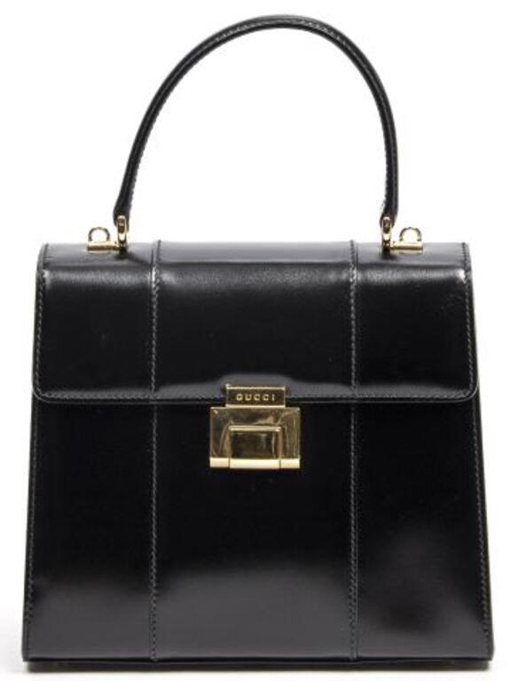 Appraisal: Gucci top handle handbag in black smooth leather with gold-tone