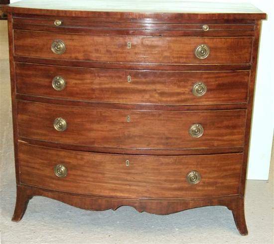 Appraisal: George III mahogany bowfronted chest with brushing slide above two