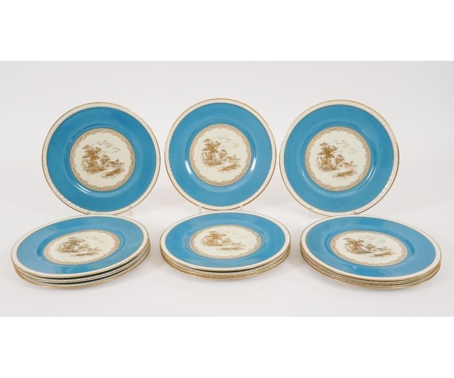 Appraisal: Twelve Charles Ahrenfeldt Limoges plates each with center landscapes and