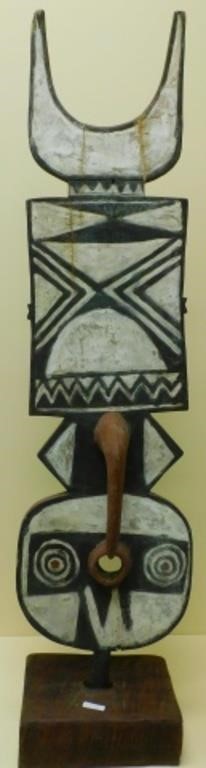 Appraisal: TWO TH C CARVED AND PAINTED AFRICAN OBJECTS To include