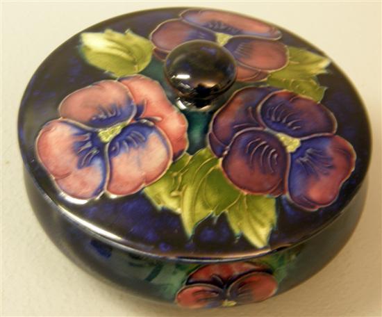 Appraisal: Moorcroft powder bowl and cover decorated with pansies on a