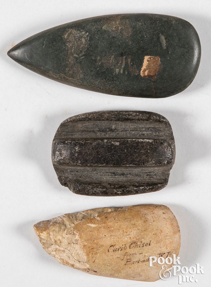 Appraisal: Three ancient stone tools Three ancient stone tools to include