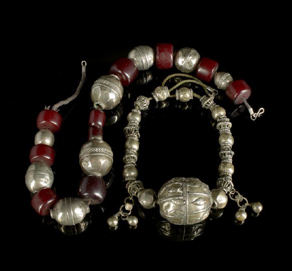 Appraisal: Two Silver Nepalese Necklaces the first composed of a large