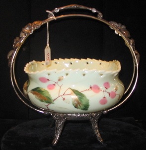 Appraisal: AN AMERICAN VICTORIAN CUSTARD GLASS BRIDES BASKET having hand enameled