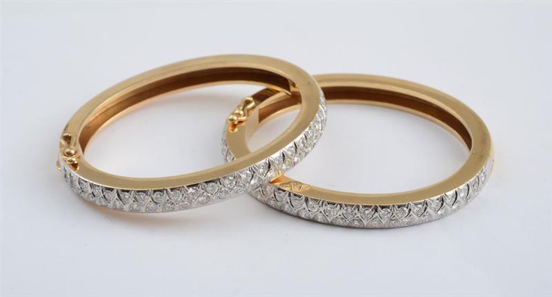 Appraisal: PAIR OF K YELLOW AND WHITE GOLD BANGLES Overall gold