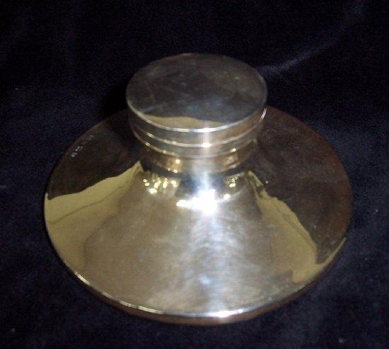 Appraisal: A capstan inkwell with hinged circular lid WN Ltd Birmingham