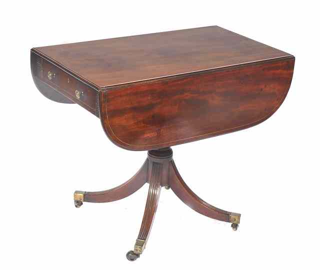 Appraisal: A REGENCY MAHOGANY AND BRASS STRUNG PEMBROKE TABLE the top