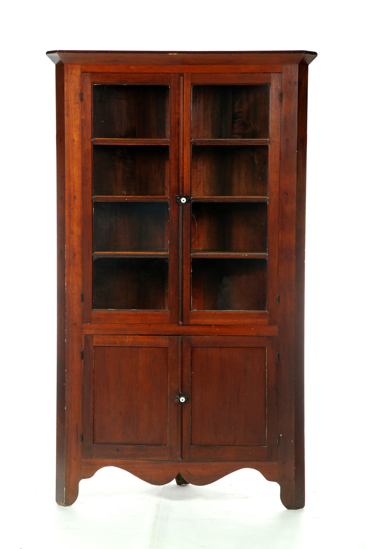 Appraisal: ONE-PIECE CORNER CUPBOARD American mid th century cherry with pine