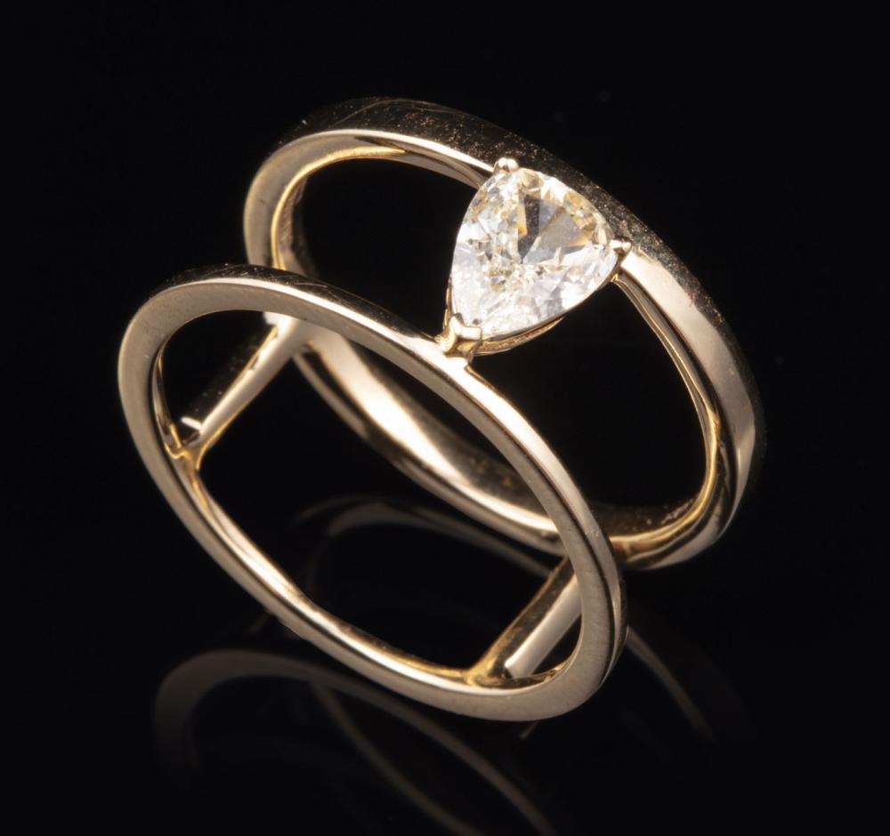 Appraisal: kt Yellow Gold and Diamond Double Band Ring center pear