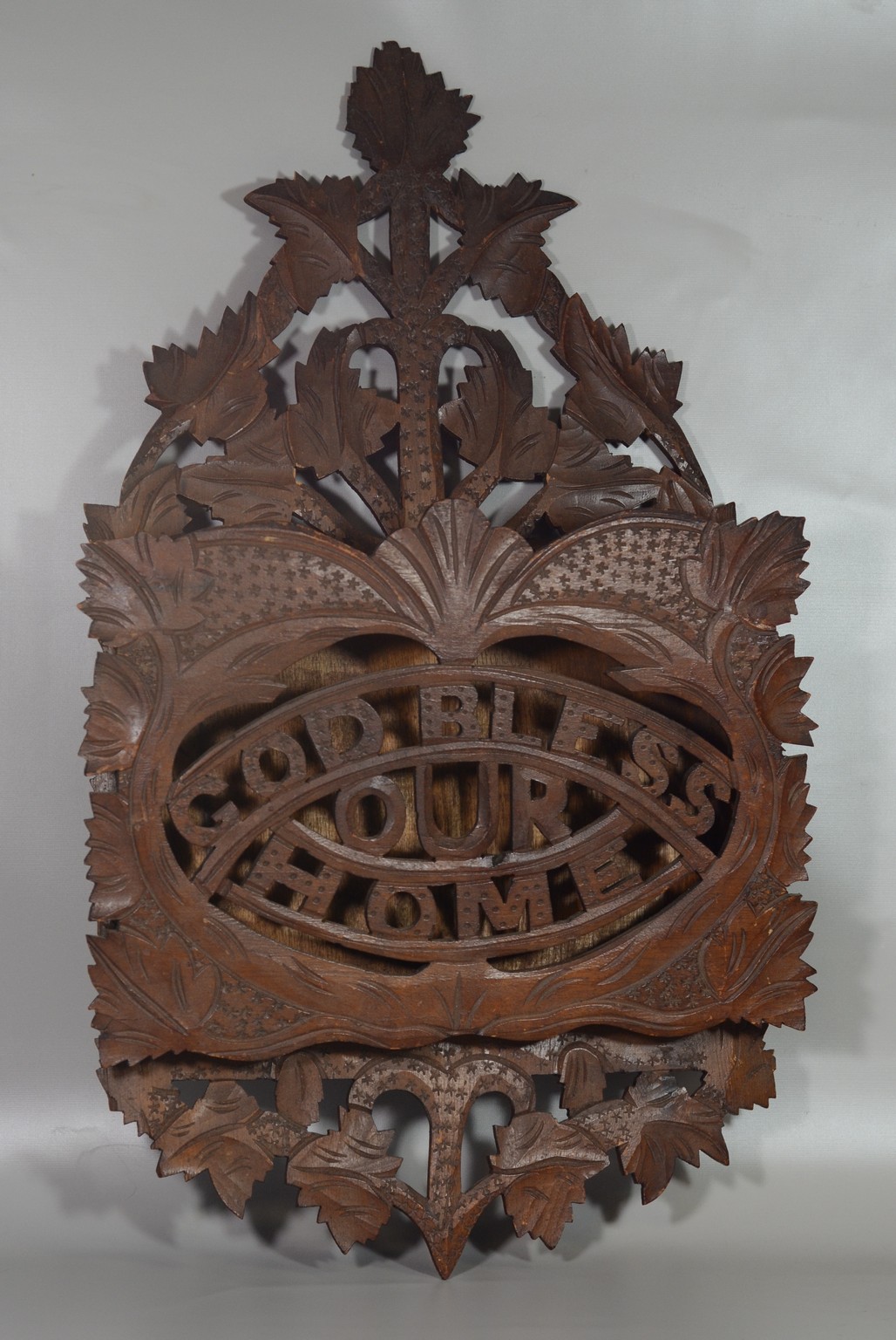 Appraisal: Carved walnut folk art wall rack God Bless Our Home