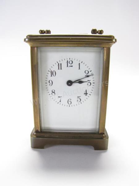 Appraisal: French Brass Carriage Clock beveled glass plain rectangular case on