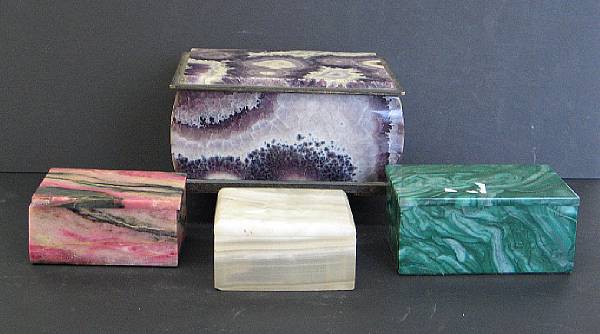 Appraisal: Four hardstone rectangular table boxes Comprising a silver and amethyst