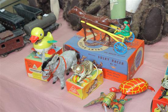 Appraisal: GROUP OF SEVEN MECHANICAL TOYS ''Quak Quak'' mechanical movement duck