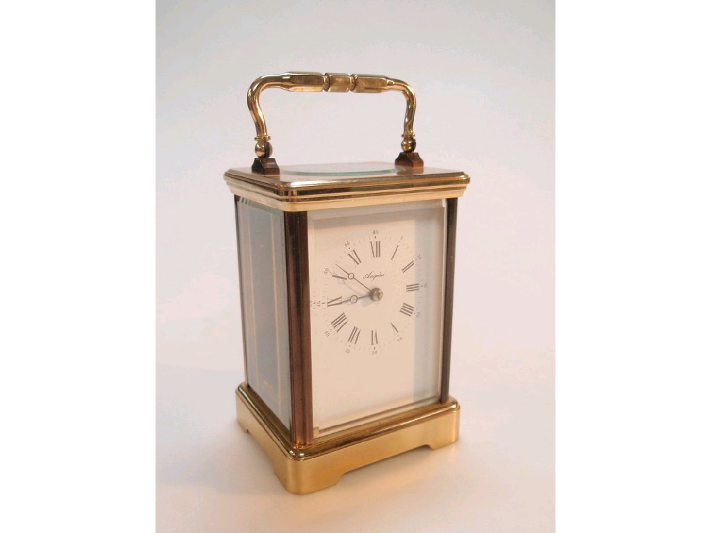 Appraisal: A gilt metal carriage clock with French timepiece lever movement