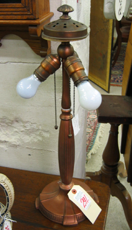 Appraisal: A SIGNED HANDEL TABLE LAMP BASE The copper finished metal