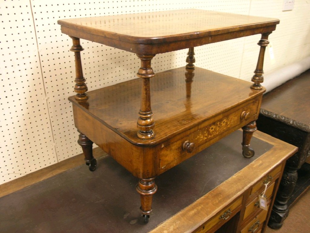 Appraisal: A Victorian inlaid walnut whatnot reduced burr veneered top above