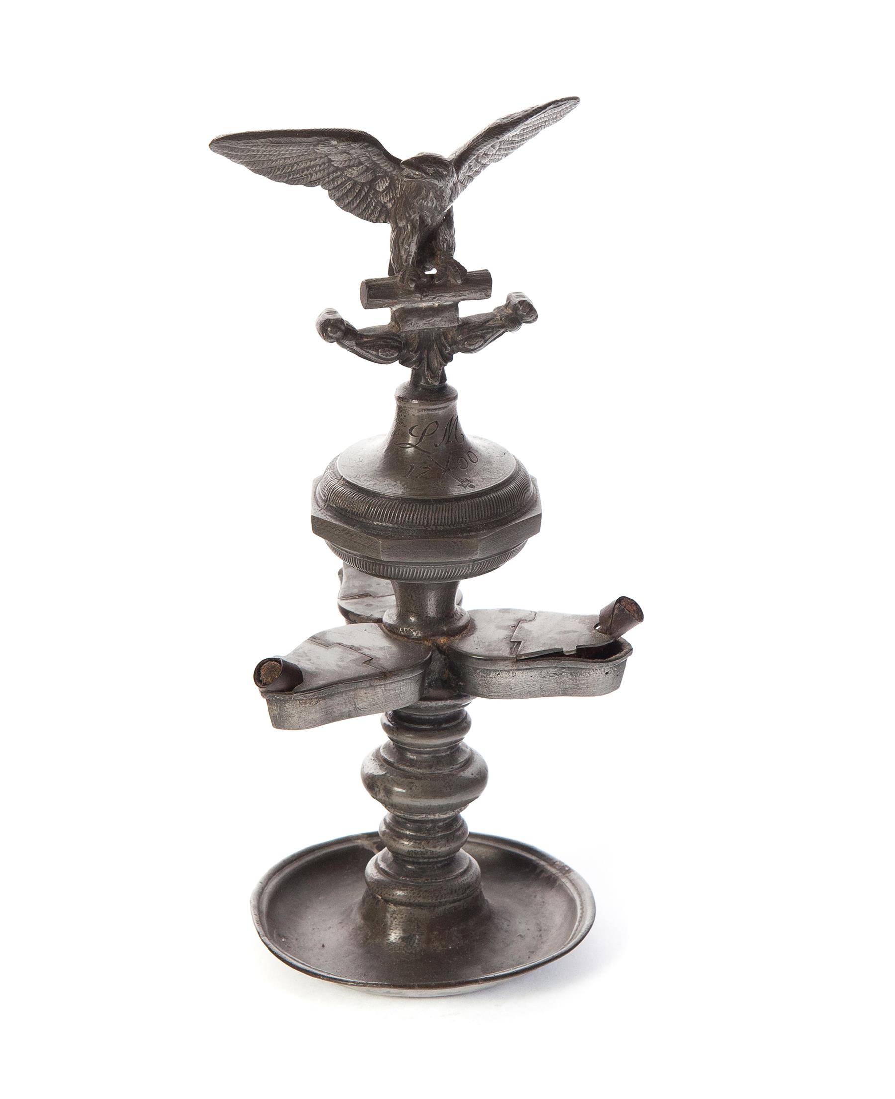 Appraisal: EUROPEAN PEWTER LAMP Inscribed LM Eagle finial with three betty