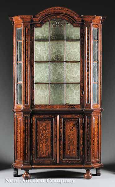 Appraisal: A Dutch Marquetry Inlaid Vitrine th c arched stepped cornice