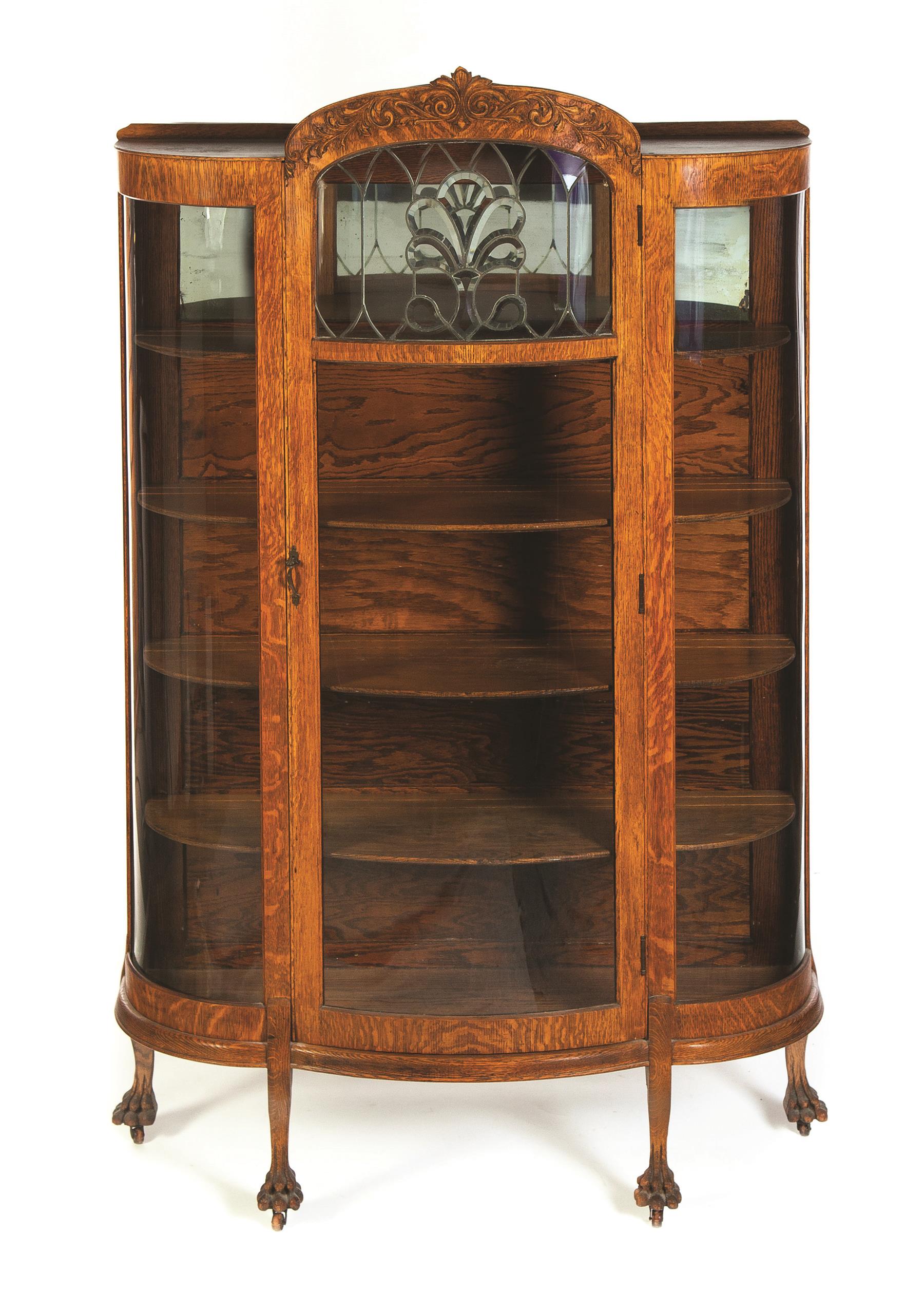 Appraisal: CURVED GLASS CHINA CABINET WITH LEADED GLASS PANEL American ca