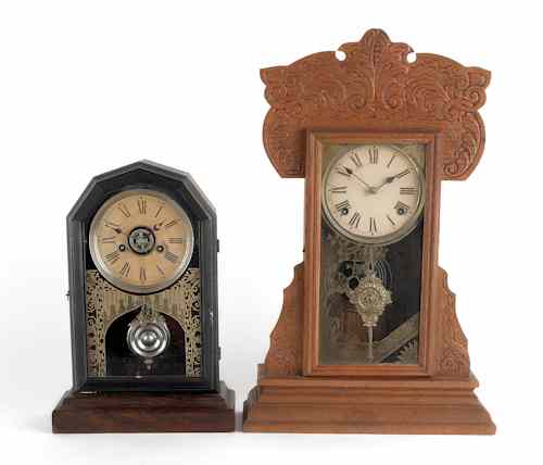 Appraisal: Pressed oak gingerbread mantel clock ca h together with an