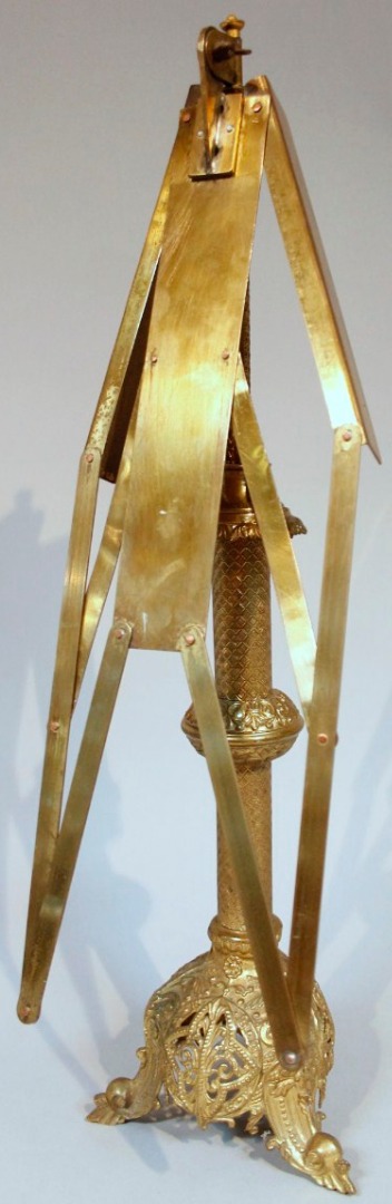 Appraisal: An early thC brass extending music lectern with articulated fan