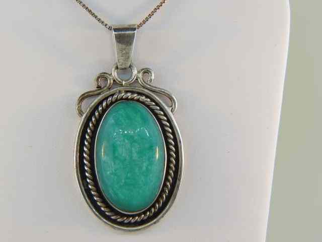 Appraisal: Indian Sterling Stone Pendant green oval cabachon with chain