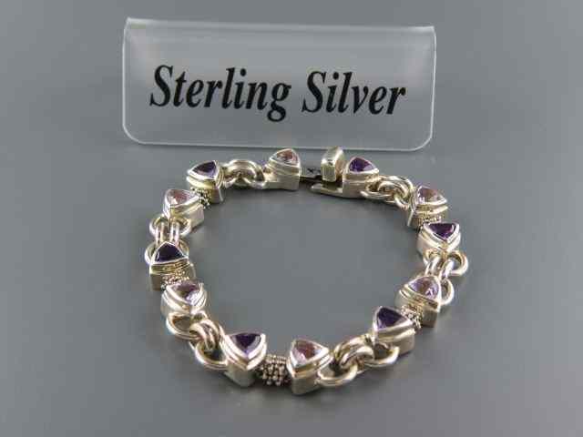 Appraisal: Amethyst Sterling Silver Bracelet rich alternating light dark trillion cut