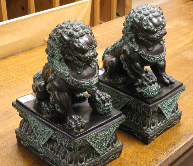 Appraisal: PAIR OF CHINESE BRONZE FOO LIONS both lion figures in