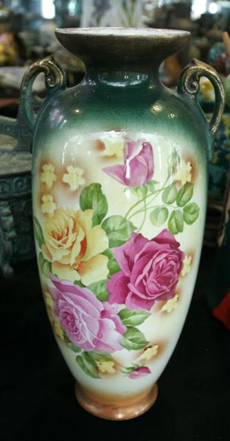 Appraisal: A pair of floral vases