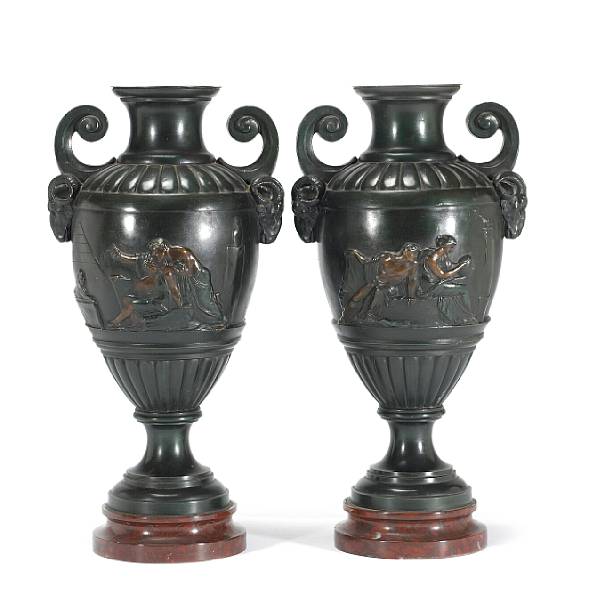 Appraisal: A pair of French patinated bronze and rouge griotte two